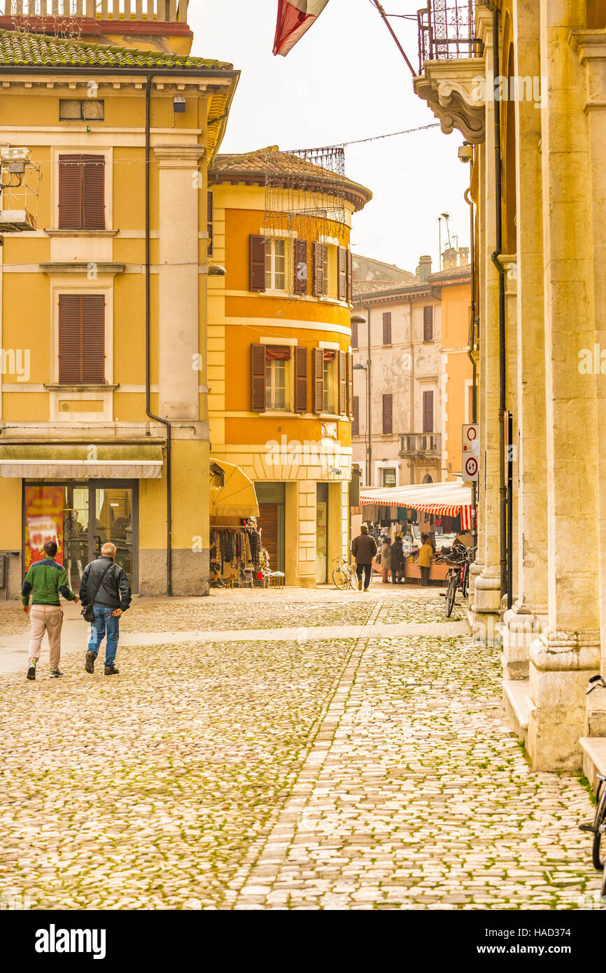 colorful houses on street of Italian town with weekly market Stock ...