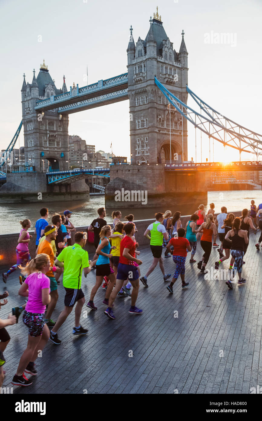 England, London, Tower Bridge and Fitness Group Running Stock Photo