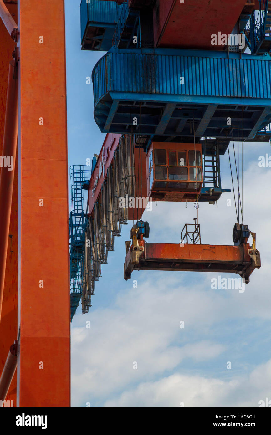 Seaport crane and container with blue cloudly sky Stock Photo