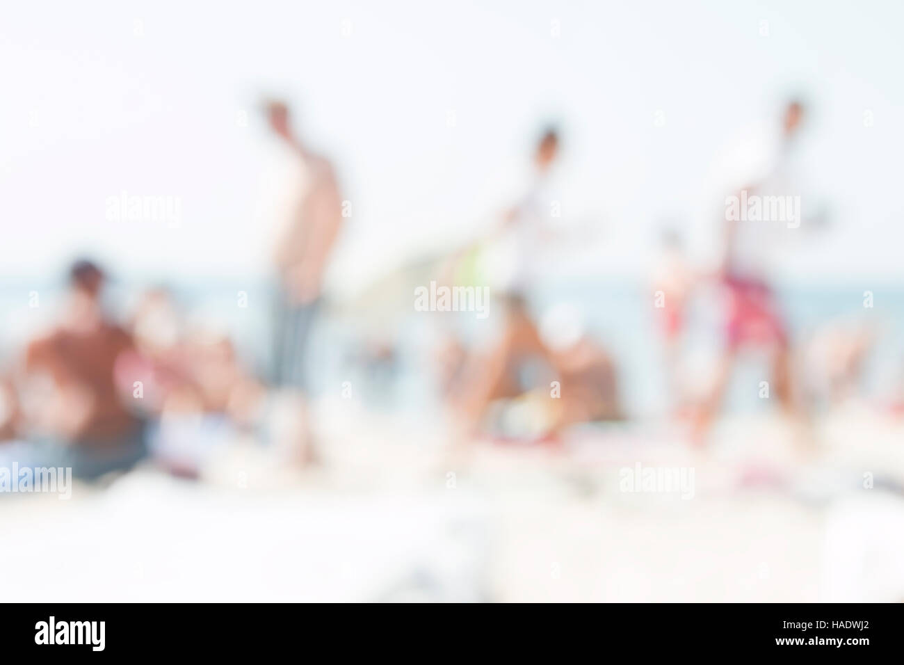 People on the beach, blurred photo for background Stock Photo
