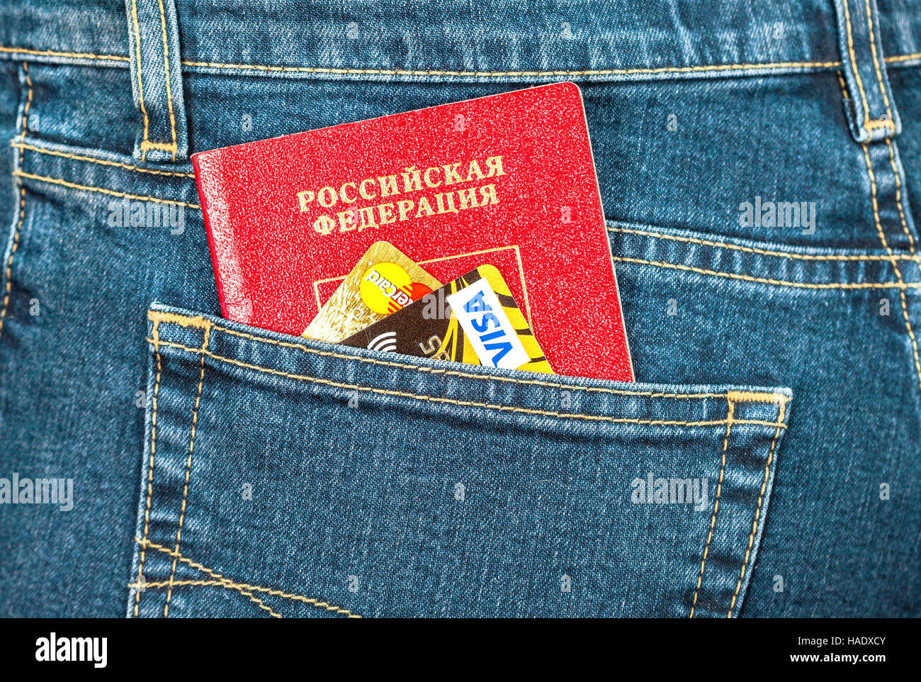 Russian passport and credit cards in back jeans pocket. Travel concept
