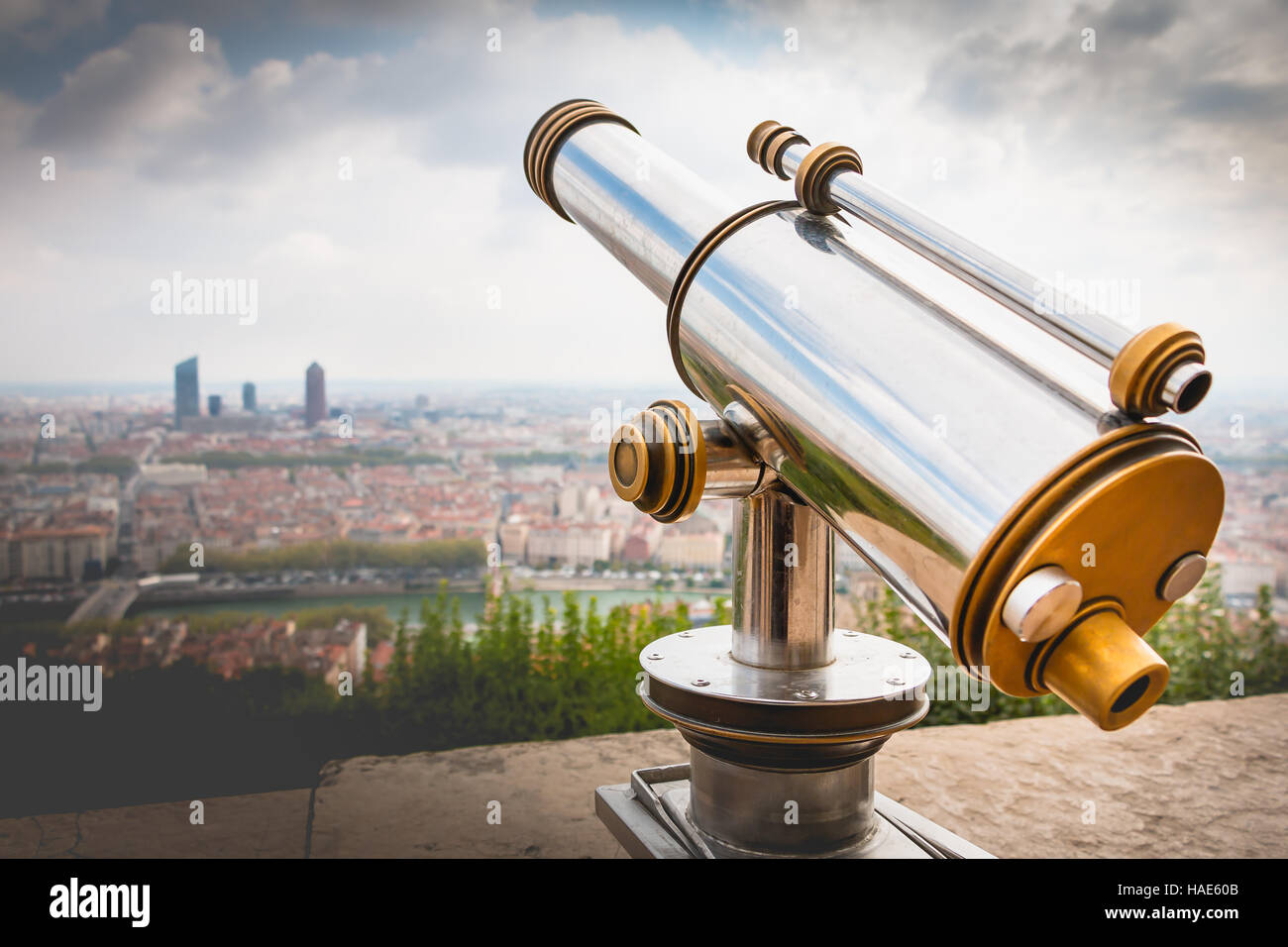 Telescope directed towards the city of Lyon in France Stock Photo