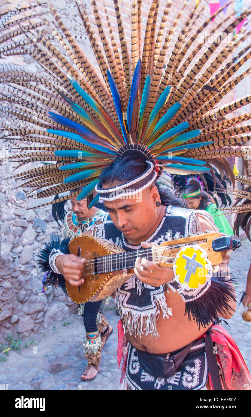 Native American with traditional costume participates at the festival of Valle del Maiz in San Miguel de Allende ,Mexico. Stock Photo