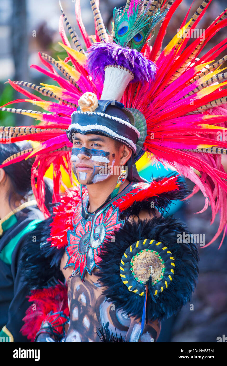 Native American with traditional costume participates at the festival of Valle del Maiz in San Miguel de Allende ,Mexico. Stock Photo