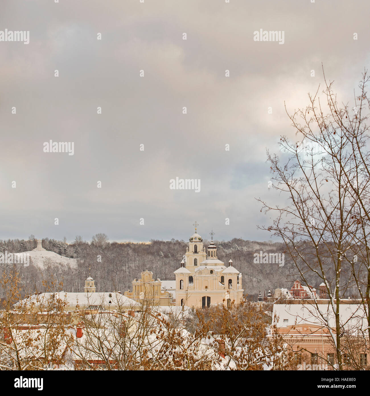 Church, hill of three crosses and roof of buildings in winter, view from hill, Vilnius, Lithuania Stock Photo
