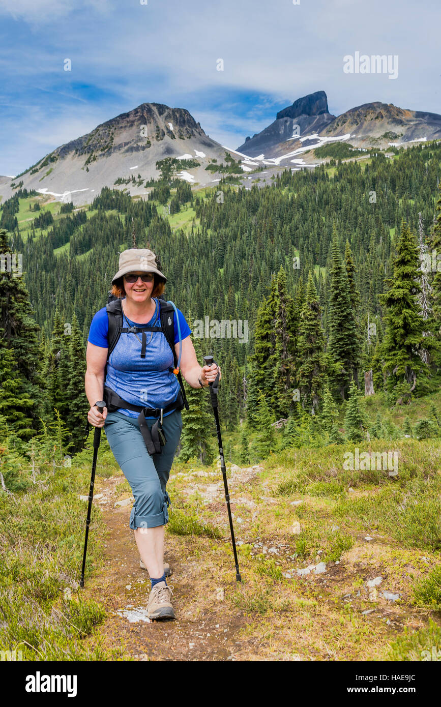 Woman hiking at Black Tusk meadows, Garibaldi Provincial Park, British Columbia, Canada Stock Photo