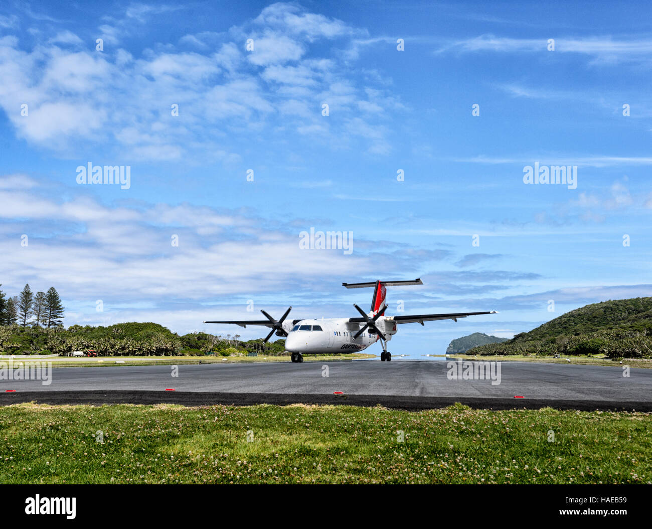 QantasLink de Havilland DHC8 200 Series DASH 8 Aircraft taxiing on Lord Howe Island runway, New