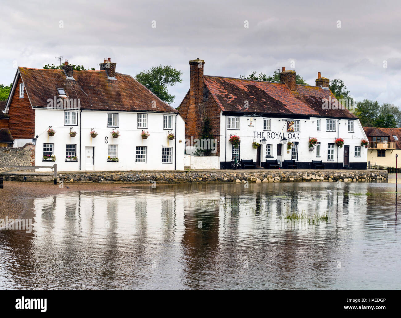 Old Cottages and The Royal Oak Inn at Langstone Quay, Hampshire, UK. Stock Photo