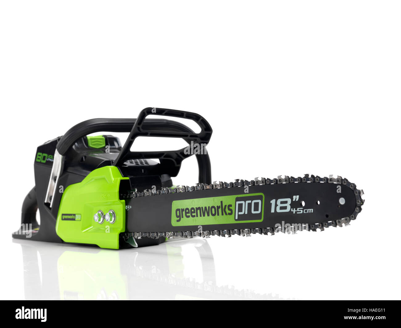 Electric Cordless battery powered chainsaw Greenworks isolated on white background Stock Photo