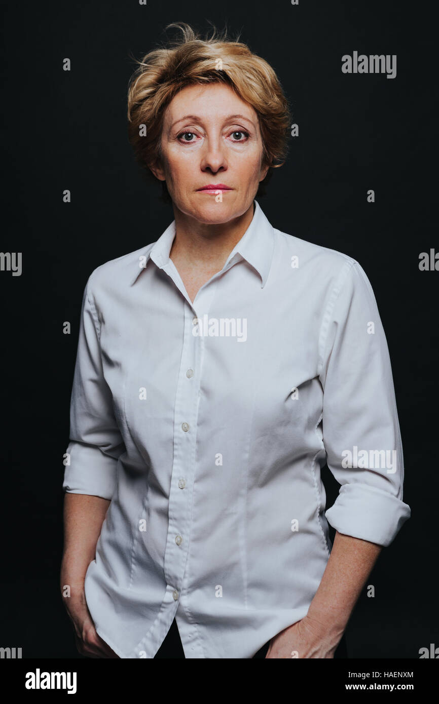 Serious successful middle aged woman hi-res stock photography and ...