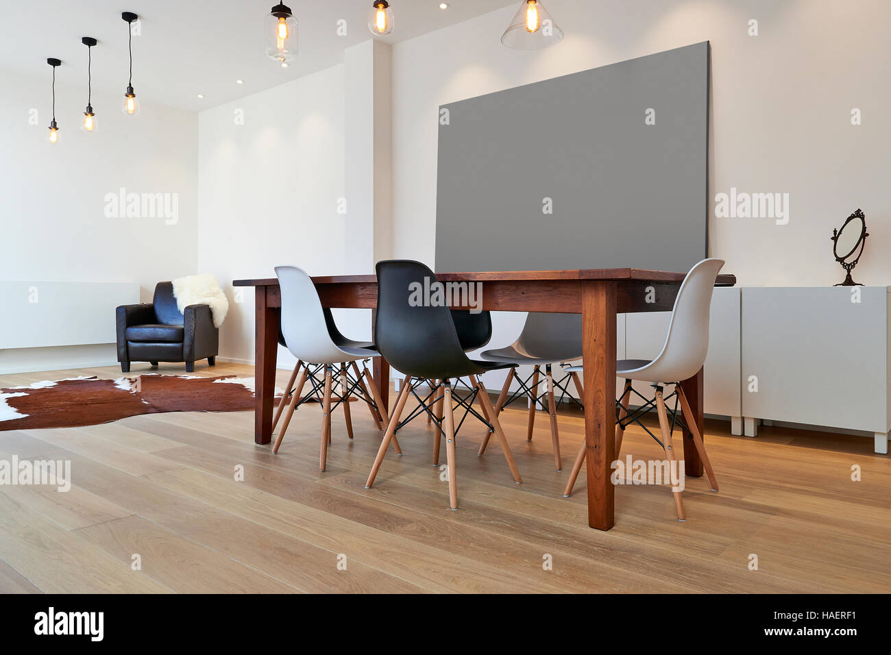 Empty table and chairs in luxury living room Stock Photo - Alamy