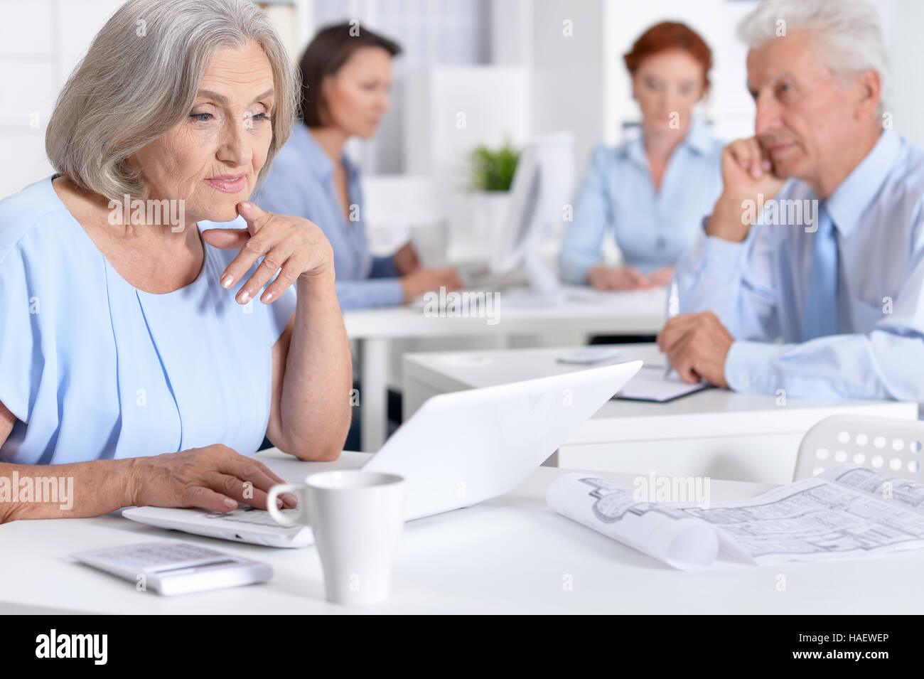 Businesspeople Working In Office Stock Photo - Alamy
