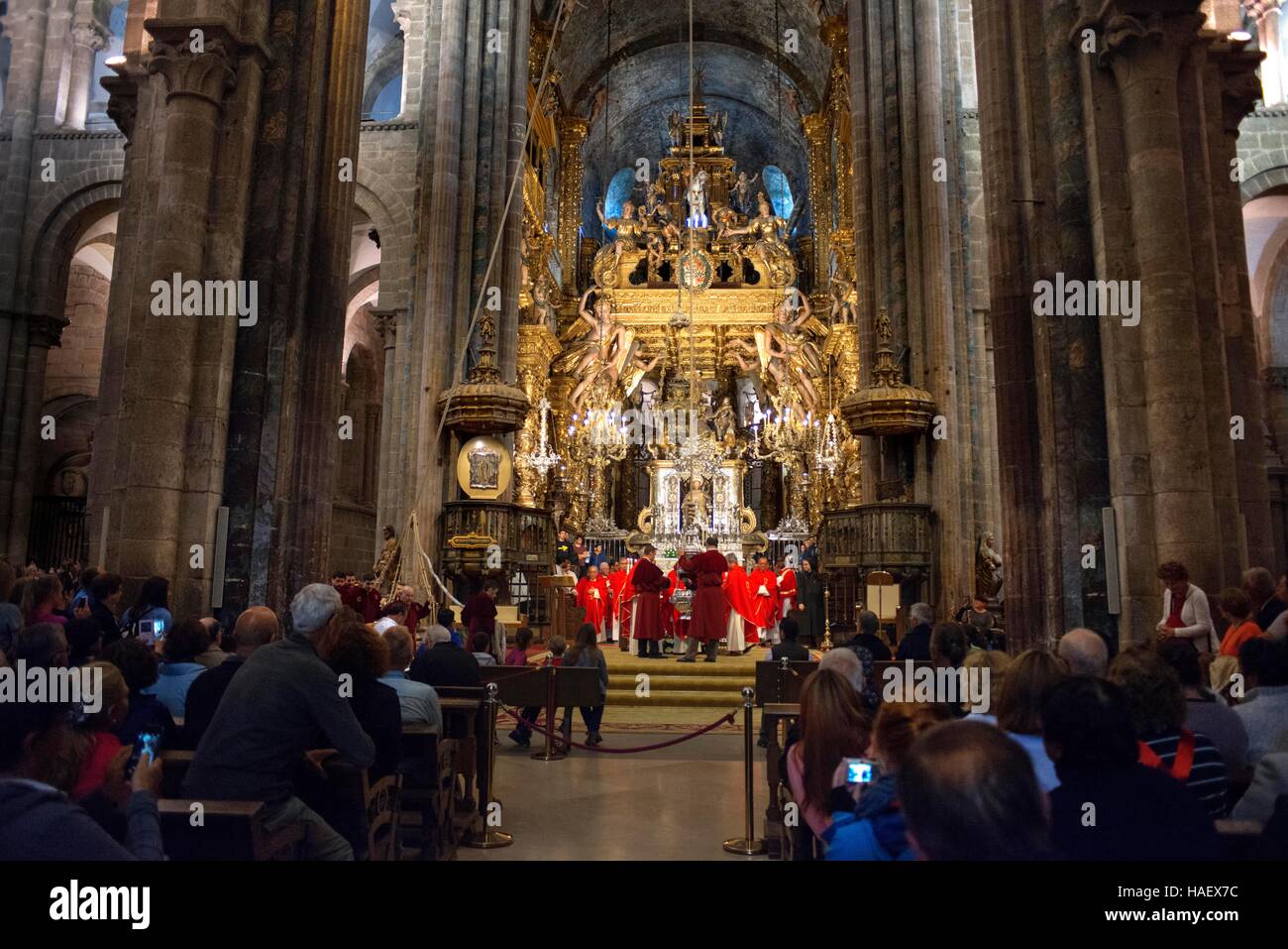 Botafumeiro ceremony in the Cathedral of Santiago de Compostela, A Coruña, Spain. The last stop of the Transcantabrico Gran Lujo luxury train. Stock Photo