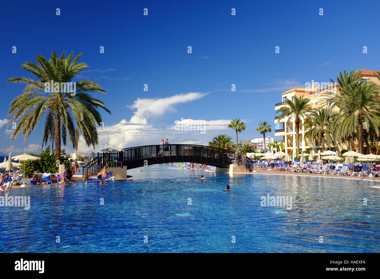 A holiday resort pool, features and buildings Stock Photo