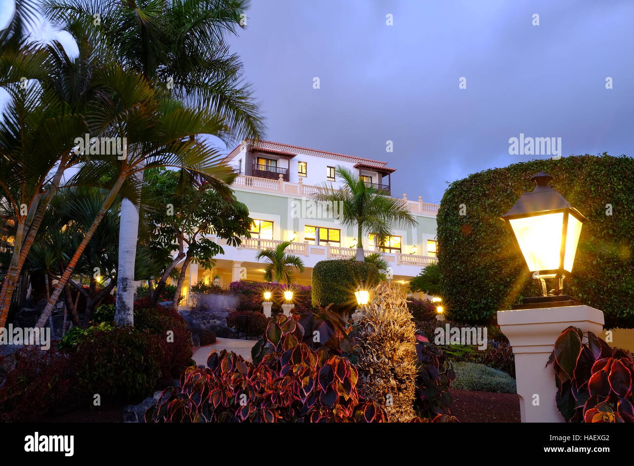 A tropical hotel resort at night Stock Photo