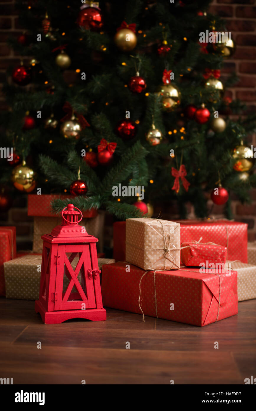 Boxes with Christmas gifts under the tree Stock Photo