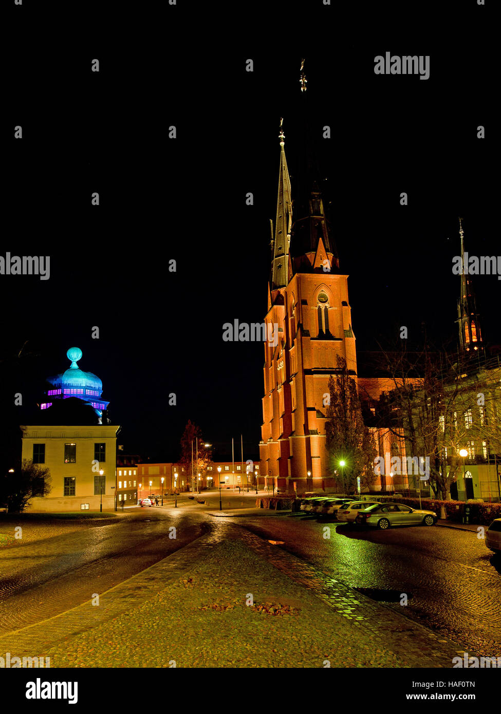 Gustavianum and Uppsala Cathedral illuminated, Uppsala, Sweden Stock Photo