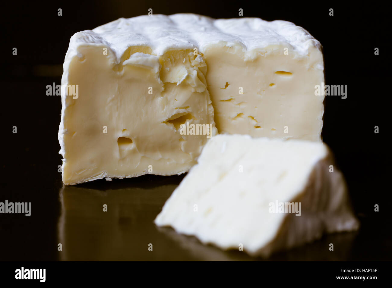Camembert de Normandie, soft fermented cheese made with cow milk Stock Photo