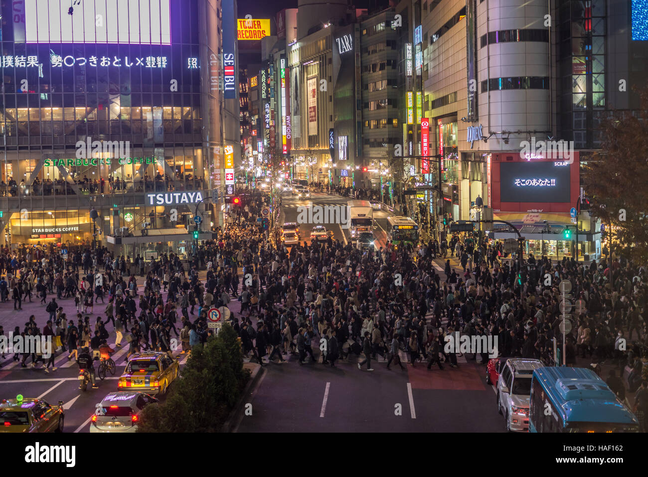 TOKYO, JAPAN - November, 22, 2014: Shibuya crossing in Tokyo, the busiest intersection in the world Stock Photo