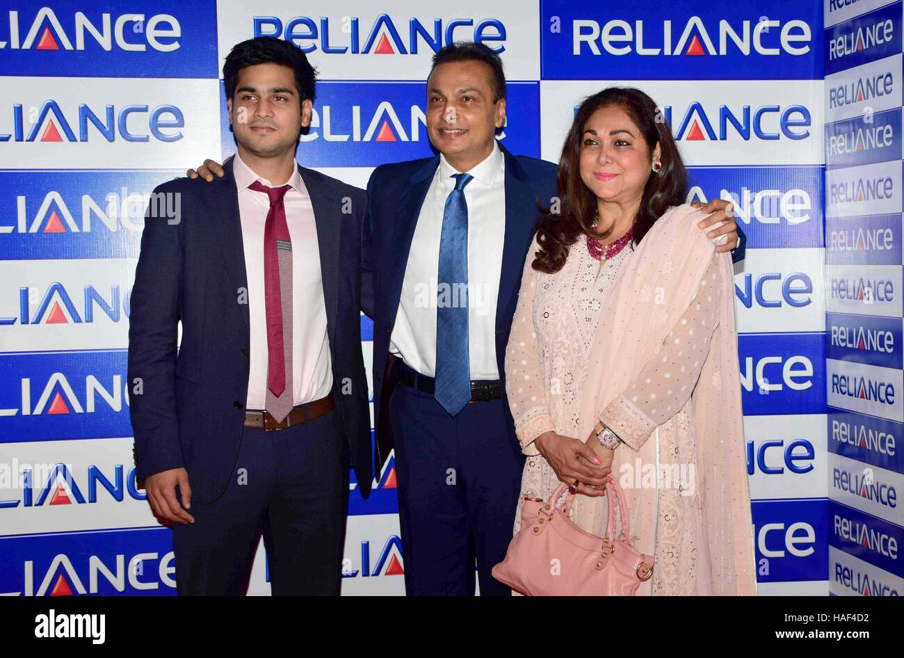 Anil Ambani Reliance Group wife Tina Ambani and Jai Anmol Ambani, Additional Director during Reliance Capital AGM, in Mumbai Stock Photo