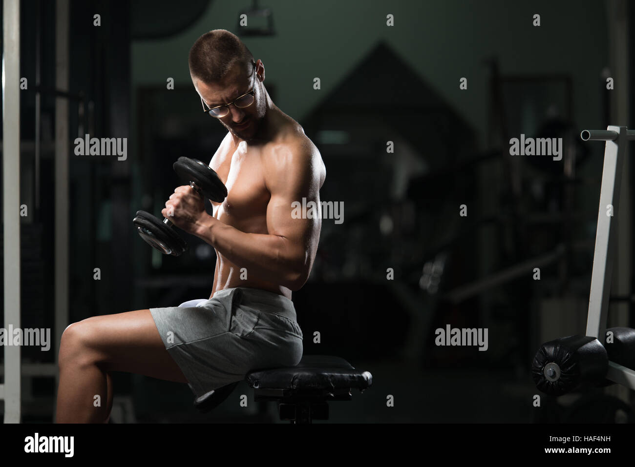 A Man Lifting Dumbbell while Wearing Virtual Goggles · Free Stock