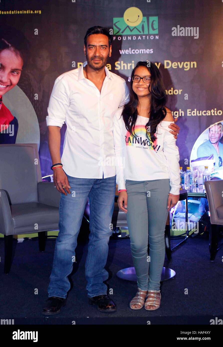 Bollywood actor Ajay Devgn daughter Nysa press conference of Smile Foundation to announce new campaign She Can Fly Mumbai Stock Photo