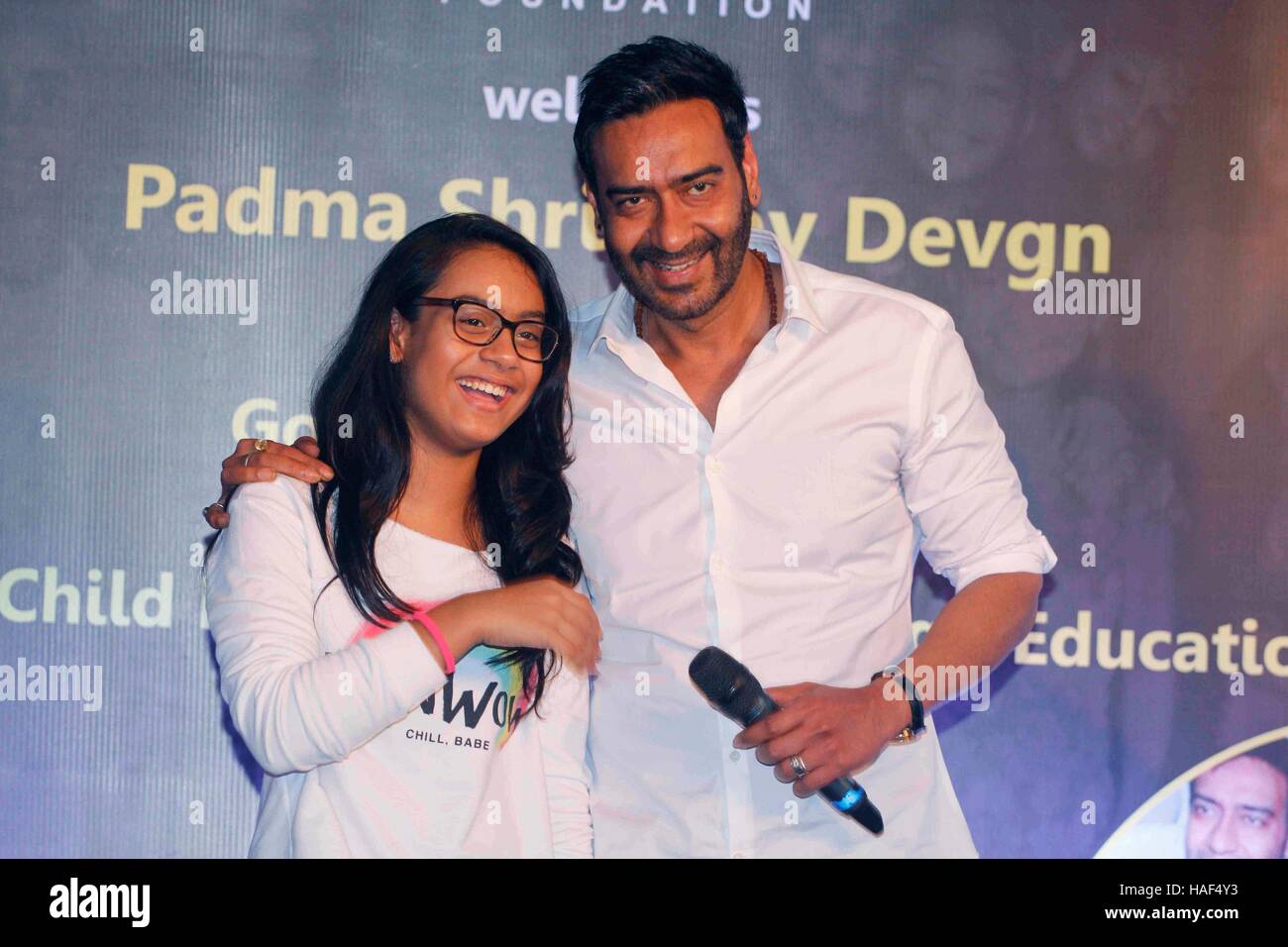 Bollywood actor Ajay Devgn daughter Nysa press conference of Smile Foundation to announce new campaign She Can Fly Mumbai Stock Photo
