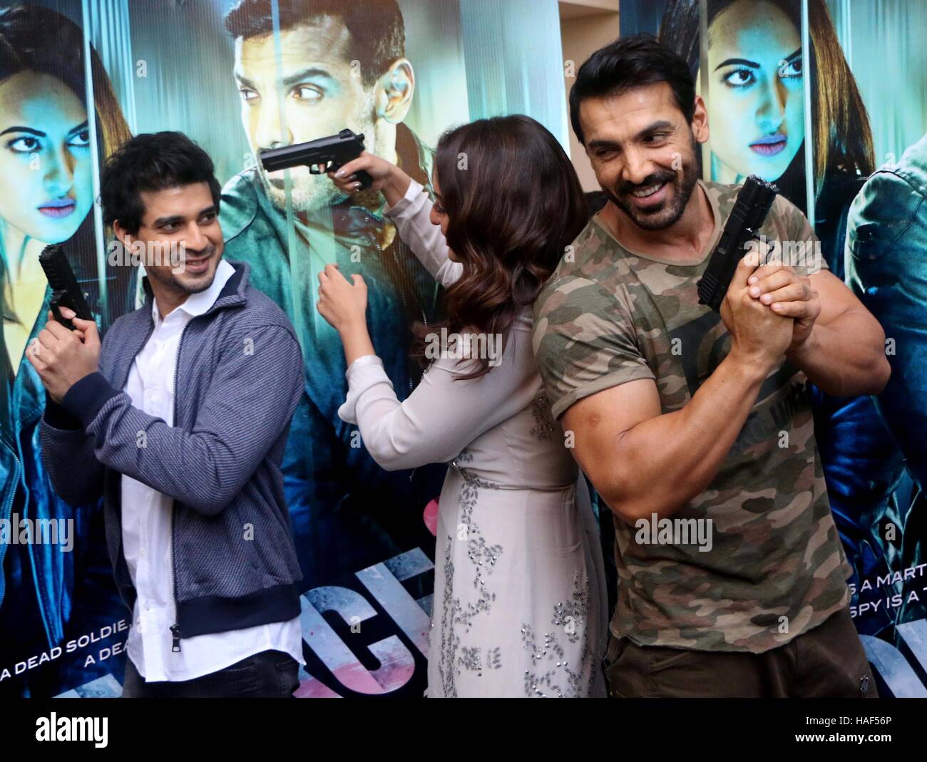 Bollywood actors Tahir Raj Bhasin, John Abraham and Sonakshi Sinha during the trailer launch of film Force 2, in Mumbai Stock Photo