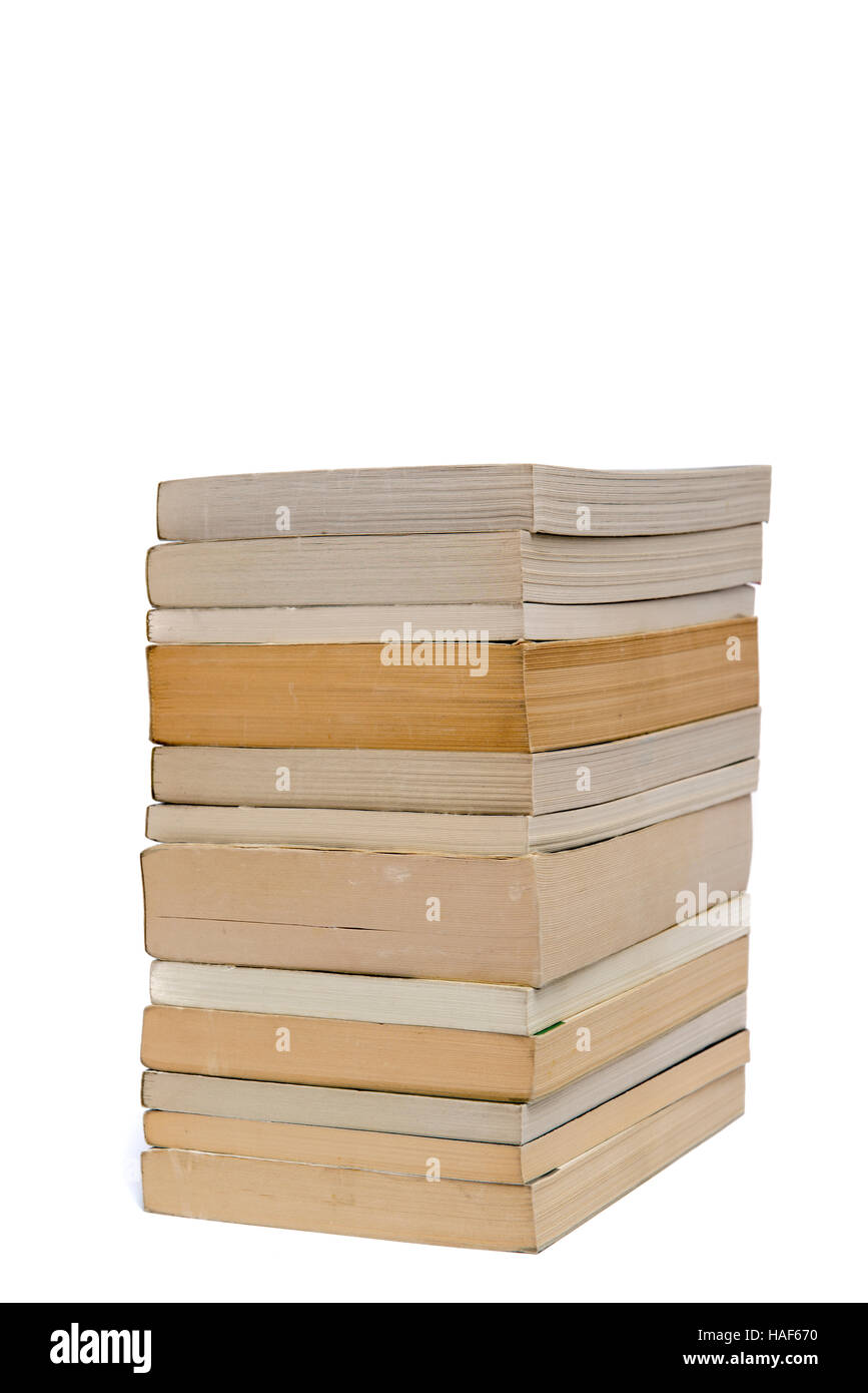 Stack of white paperback books isolated on white background with copyspace Stock Photo