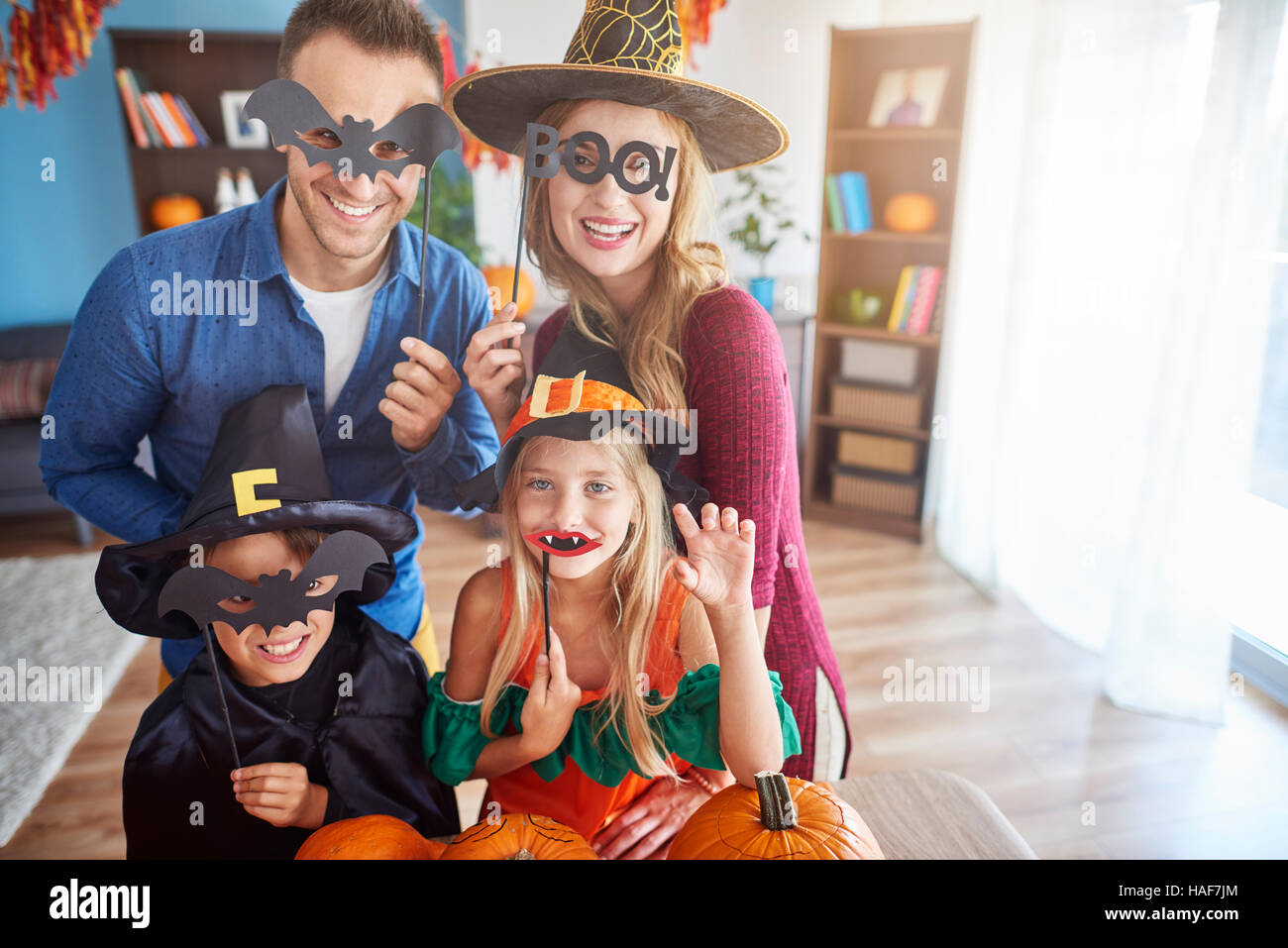 Family wearing funny halloween masks Stock Photo Alamy