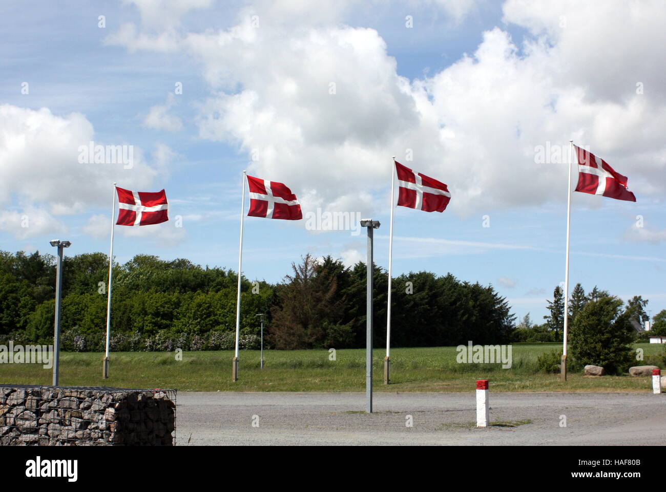 Danish flags waving in the wind on the island Bornholm. Denmark Stock Photo
