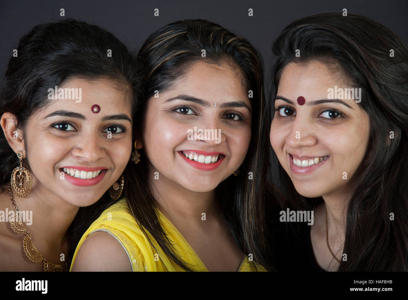Three girls laughing hi-res stock photography and images - Alamy