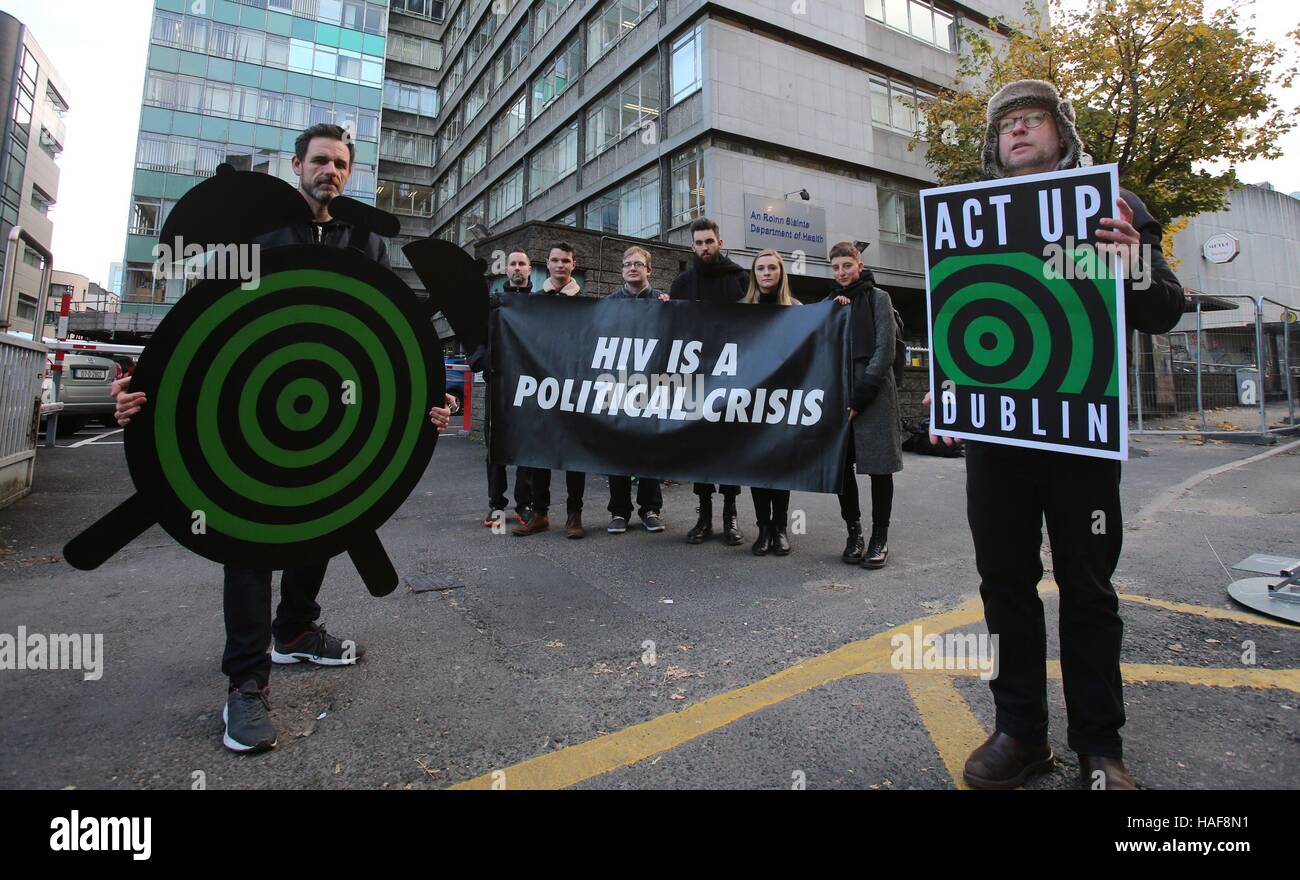 Members of the Act UP Dublin LGBT activist group protest outside the Department of Health in Dublin on the eve of World Aids day to highlight the rise of new HIV cases in Ireland. Stock Photo
