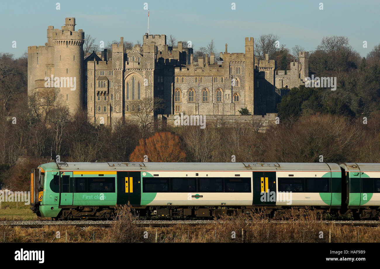 A Southern Trains train passes through Arundel in West Sussex, as rail and Tube travellers across the country suffered journeys from hell today after a spate of train faults, signal failures, staff shortages and other issues led to delays. Stock Photo