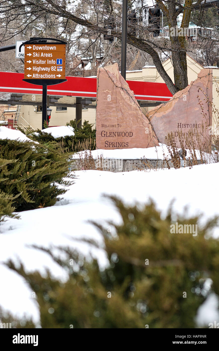 A 'Welcome to Glenwood Springs' rock sign welcomes visitors to Glenwood Springs, Colorado, in a city park. Stock Photo