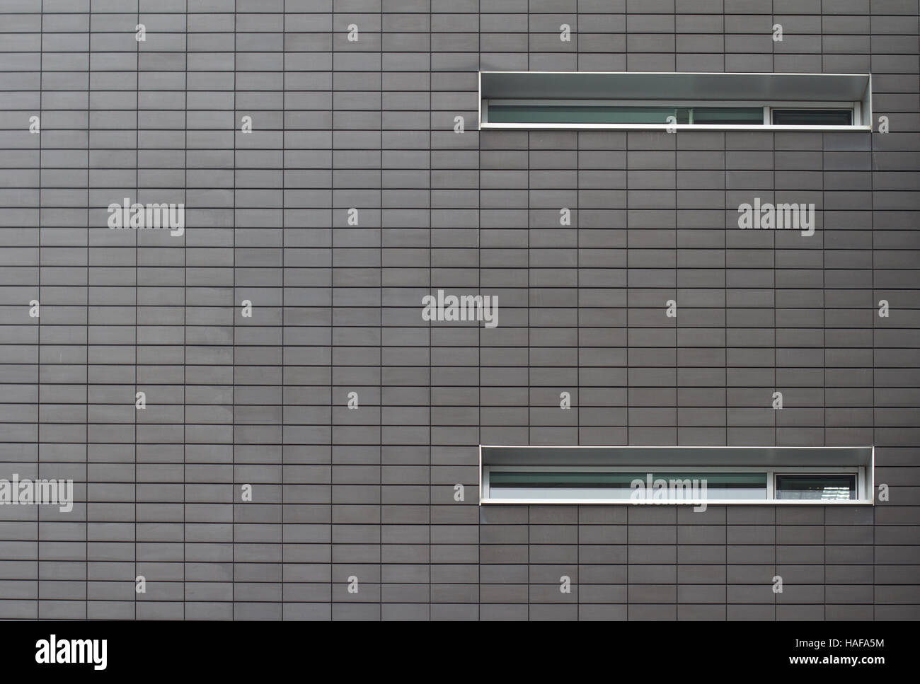 Architectural close up of an office building with metallic plates and