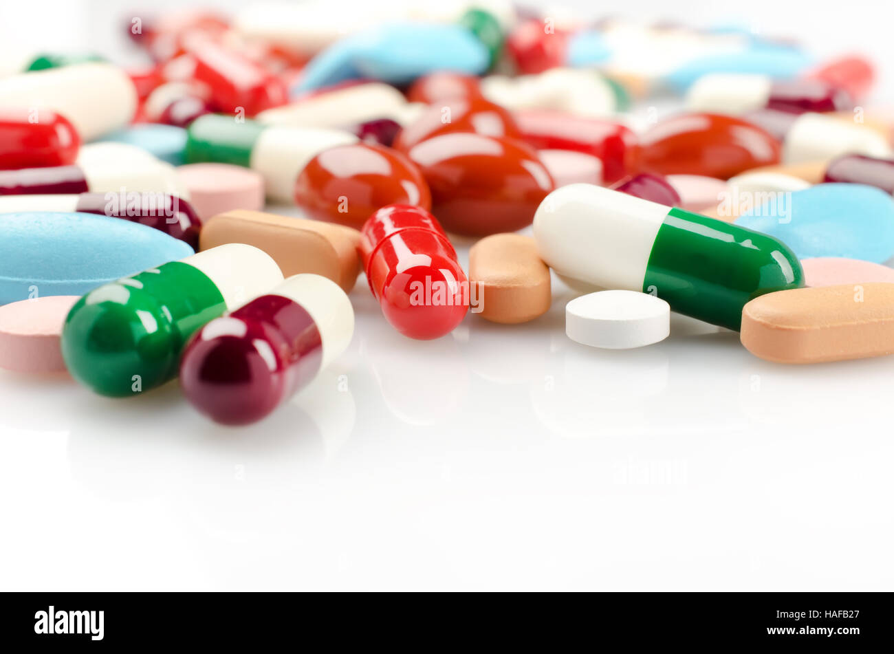 Multicolored Pills and Capsules Stock Photo