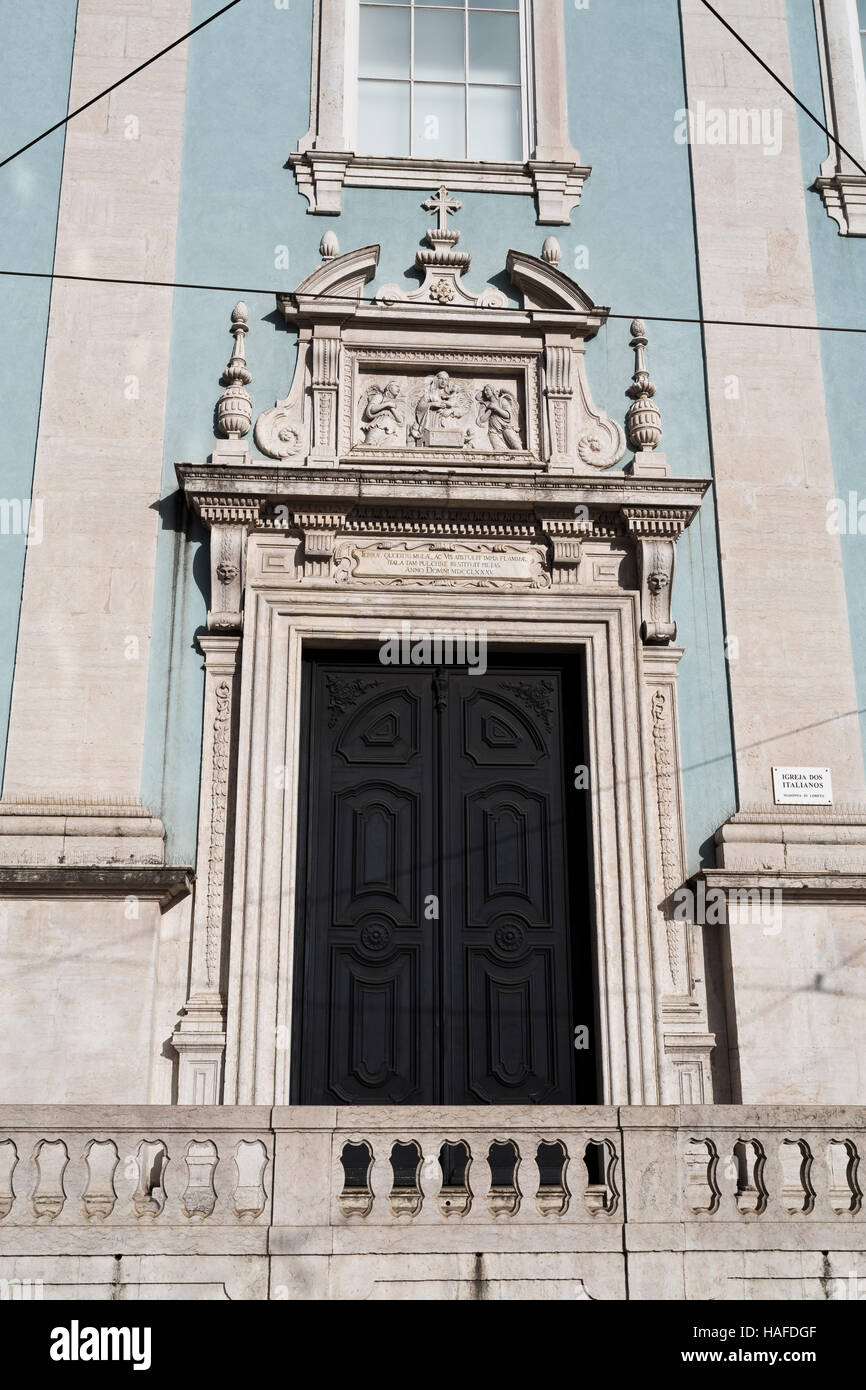 Lateral classic door to the Church of the Italians (Our Lady of Loreto) in Lisbon, Portugal Stock Photo