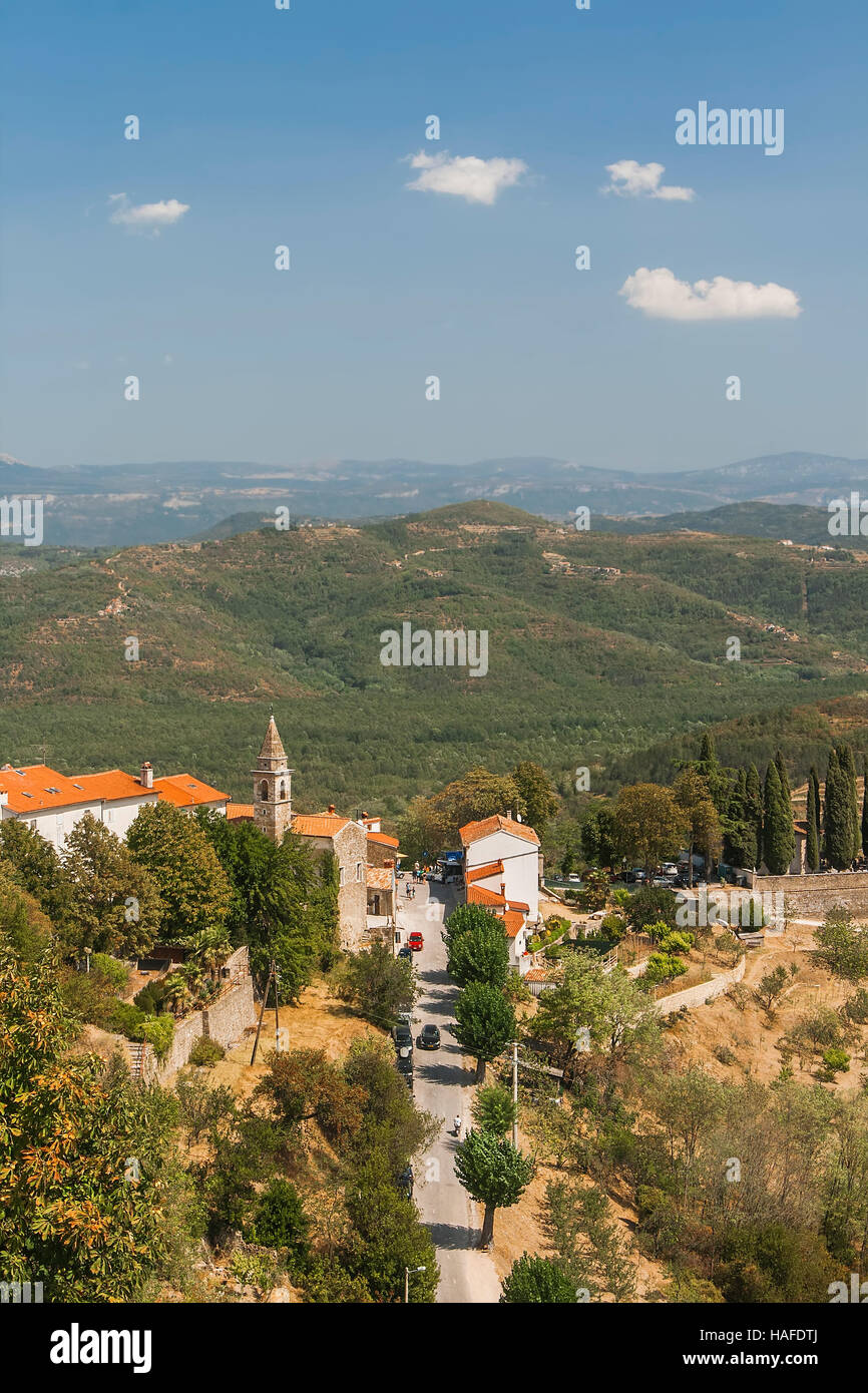 Motovun, view of the old tower and the surrounding mountains. Croatia Stock Photo