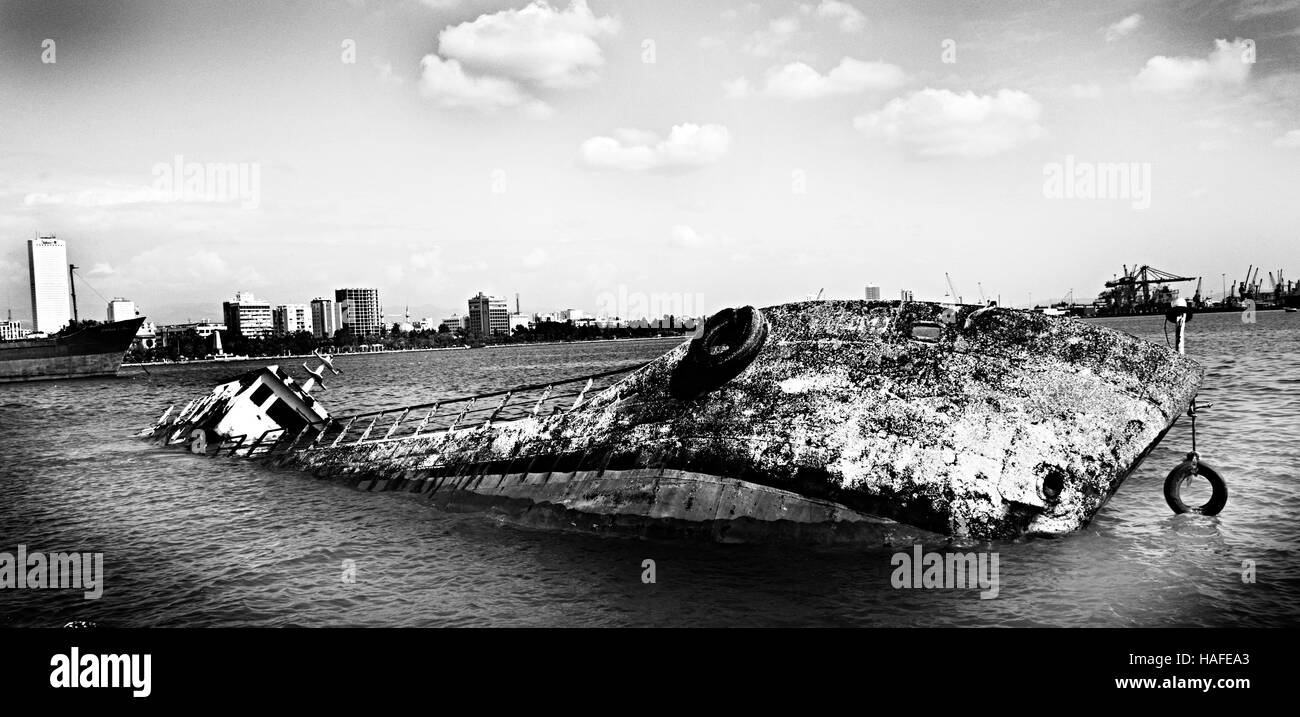 Sunken ship in the harbor of Mersin. Stock Photo