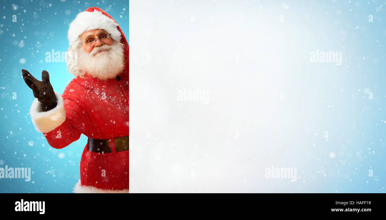 Smiling Santa Claus holding banner with blank space for Your Text ...