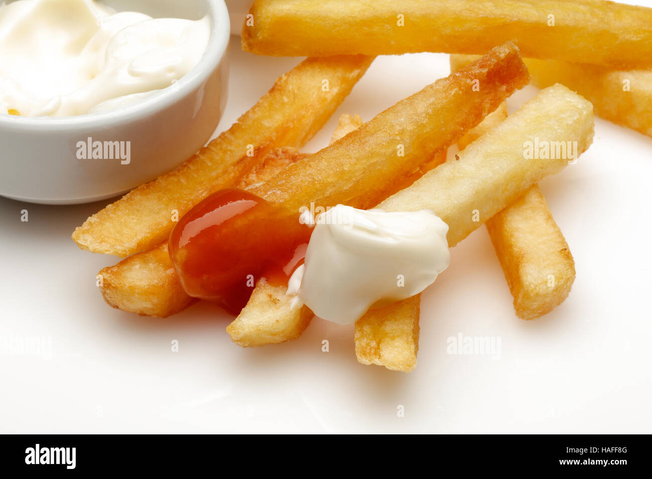 French fries with ketchup and mayonnaise Stock Photo Alamy
