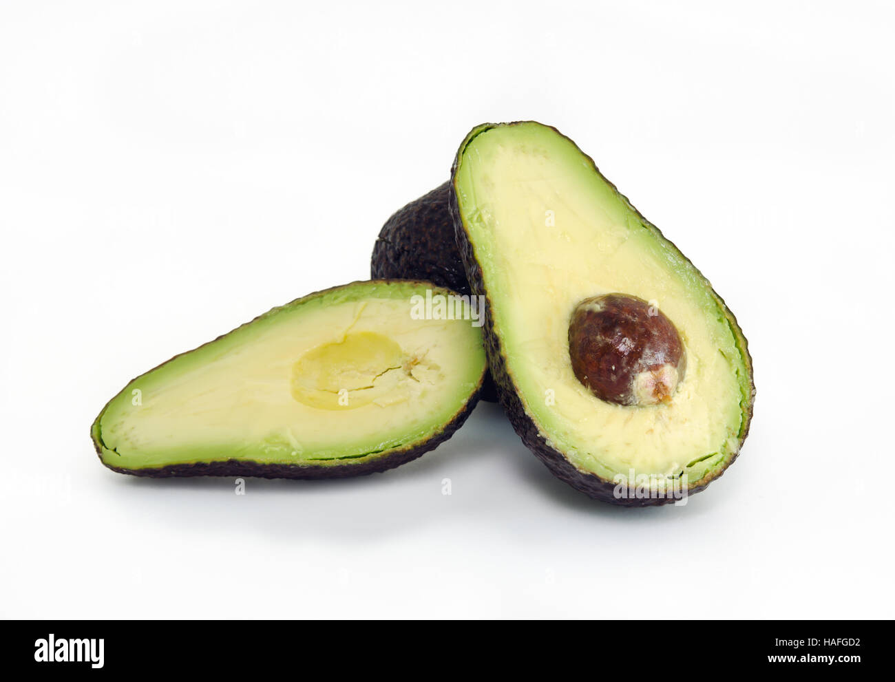 Avocado (also named as Persea americana, Lauraceae avocado, alligator pear, criollo fruit, Aguacate in Spanish, Abacate in Protugese, or avocado pear) Stock Photo