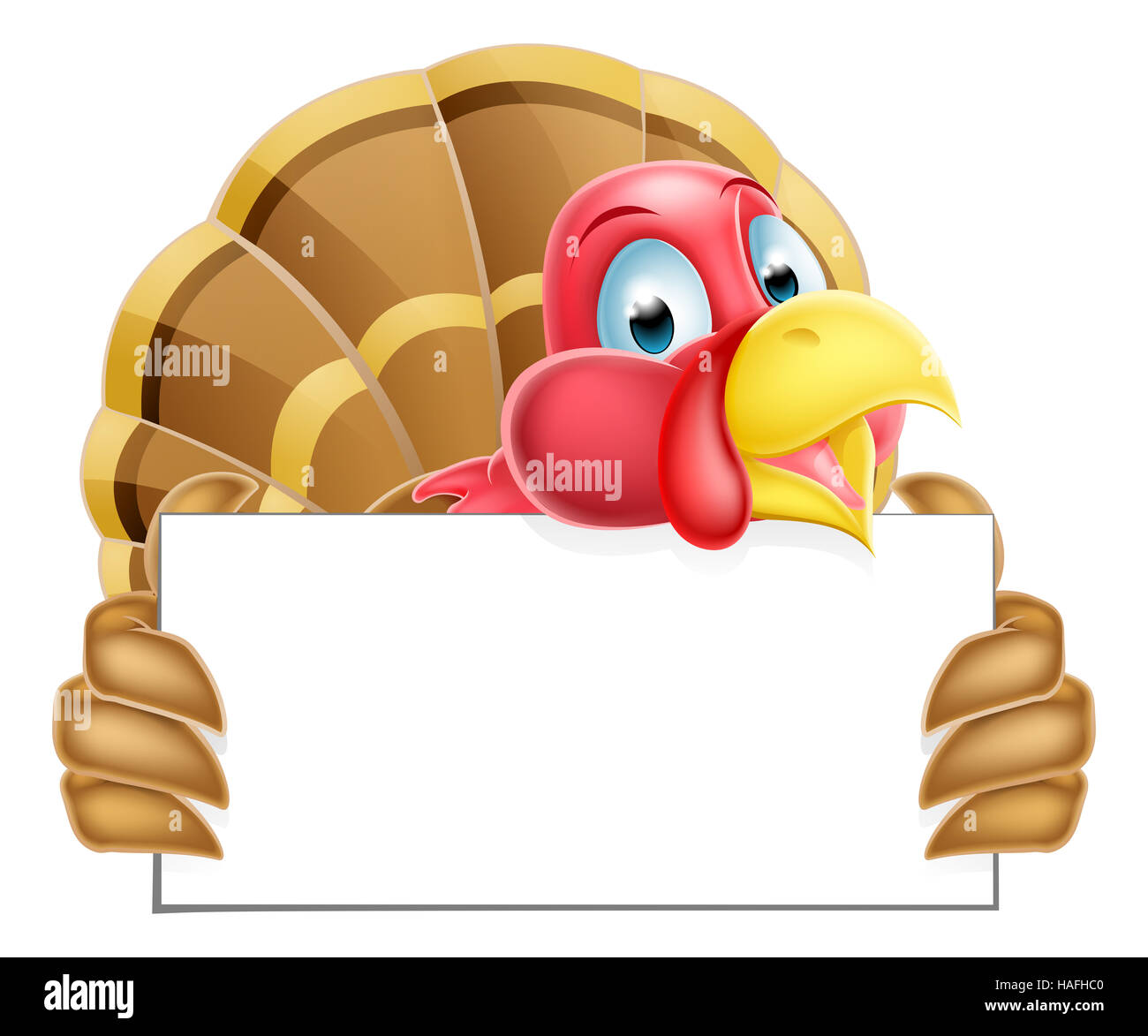 A Thanksgiving or Christmas cartoon turkey holding a sign Stock Photo