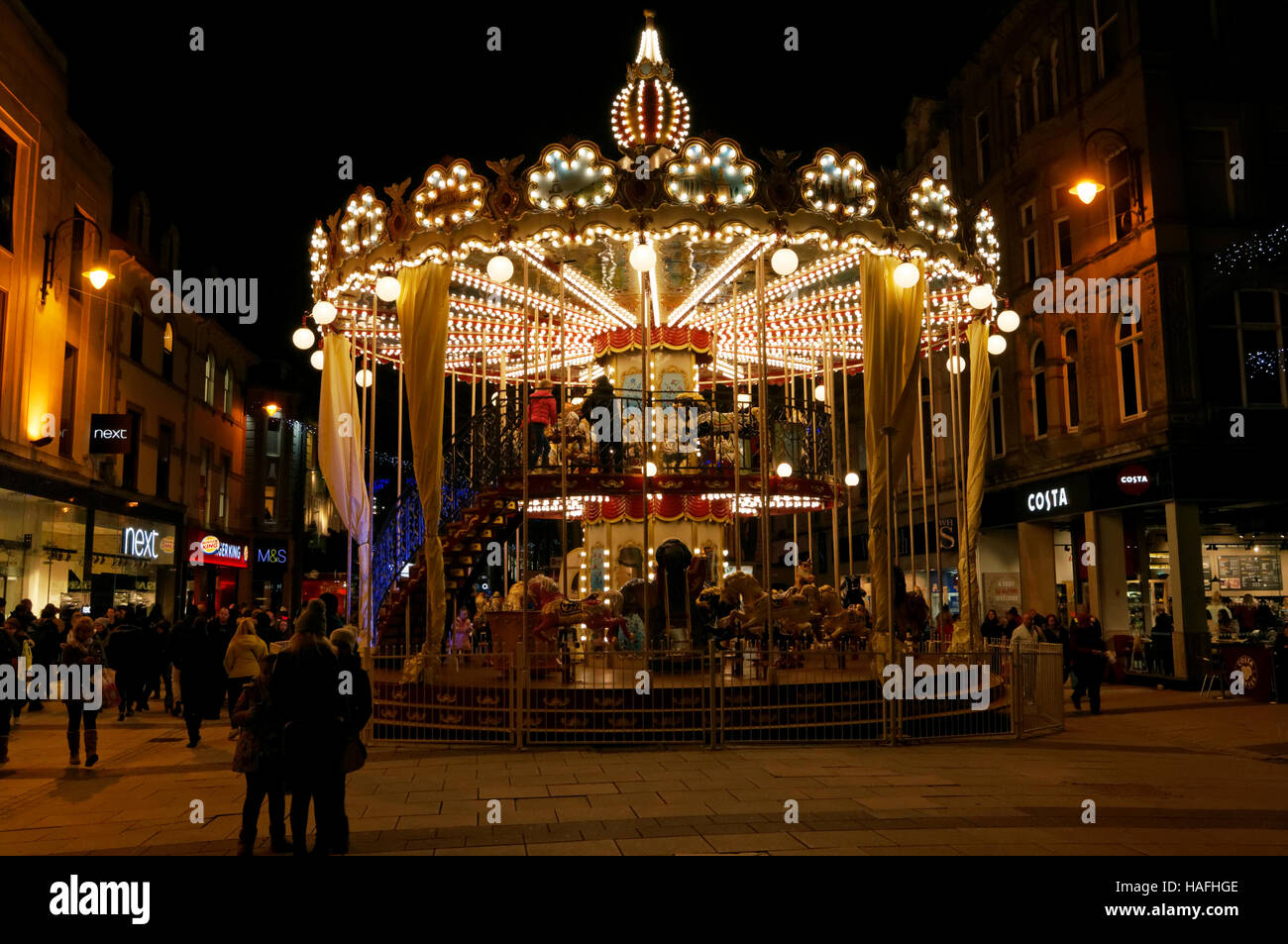Carousel at night, Queen Streeet, Cardiff, Wales. Stock Photo