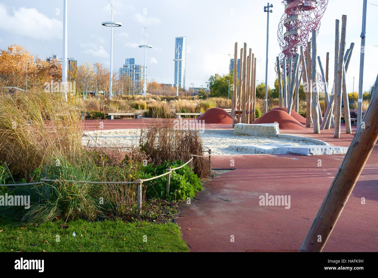 Empty children's play area with sand pit and climbing poles at Queen Elizabeth Olympic Park, Stratford, London, in Winter Stock Photo