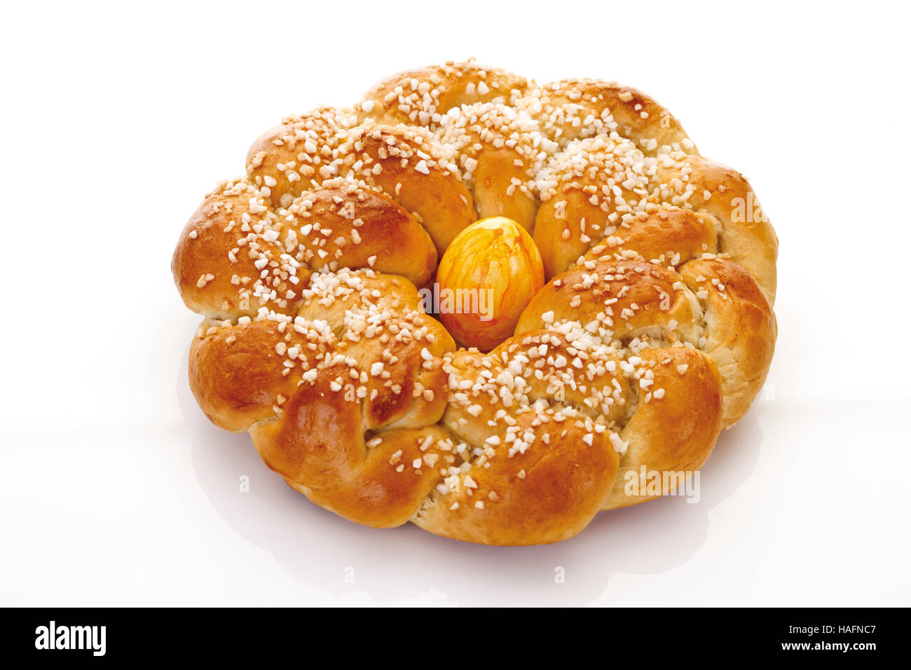 Hefekranz, German pastry with yellow easter egg Stock Photo