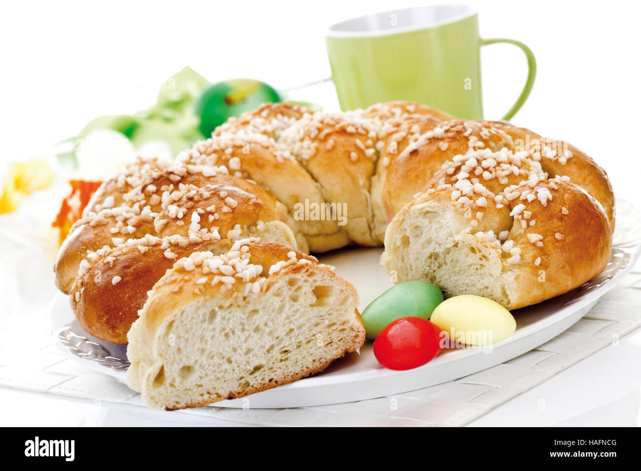 Easter table setting with Hefekranz, German pastry Stock Photo