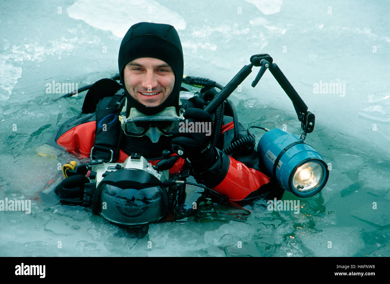 Underwater photographer icediving, Reichraming, Upper Austria, Europe Stock Photo