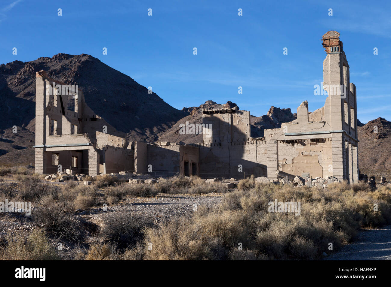 The remains of the Cook Bank Building still dominate the Rhyolite skyline just as it did when it was built in the early 1900's at a cost of $90,000. T Stock Photo